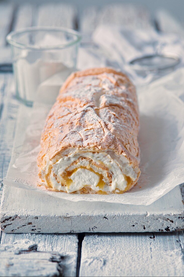 Meringue roulade with whipped cream