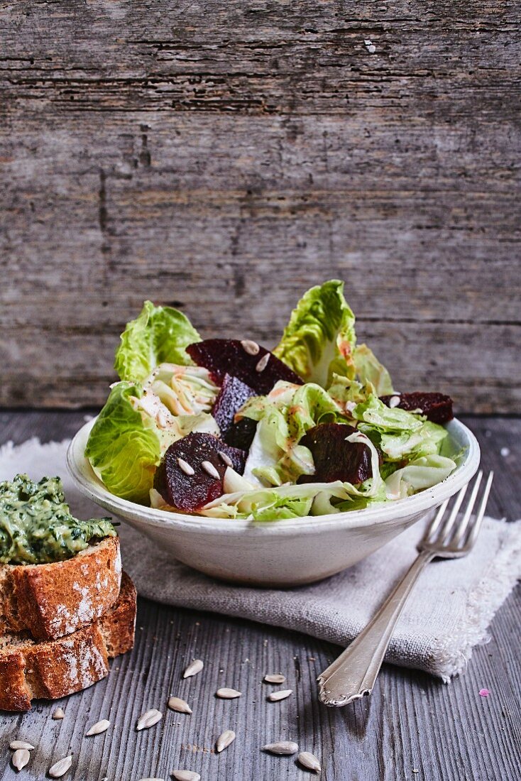 Chicory and romaine lettuce with beetroot, crostini and parsley pesto