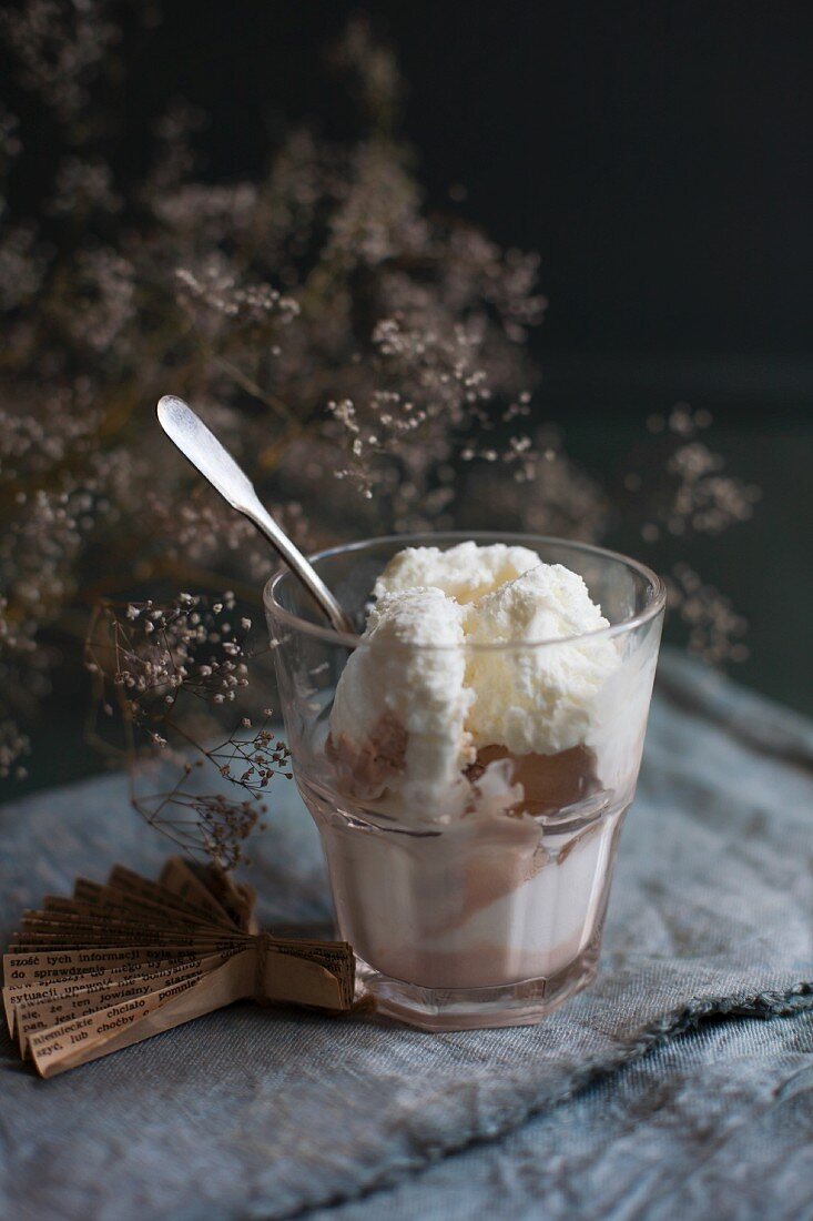 Vanilla and caramel ice cream in a glass