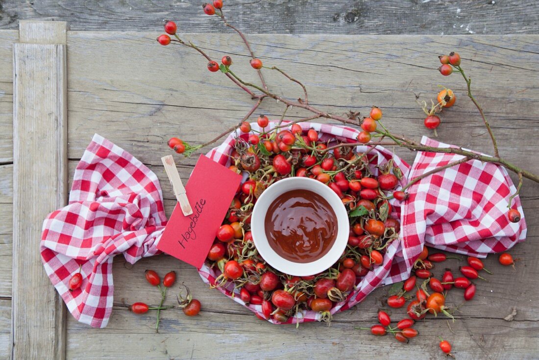 Rose hip jam and fresh rose hips