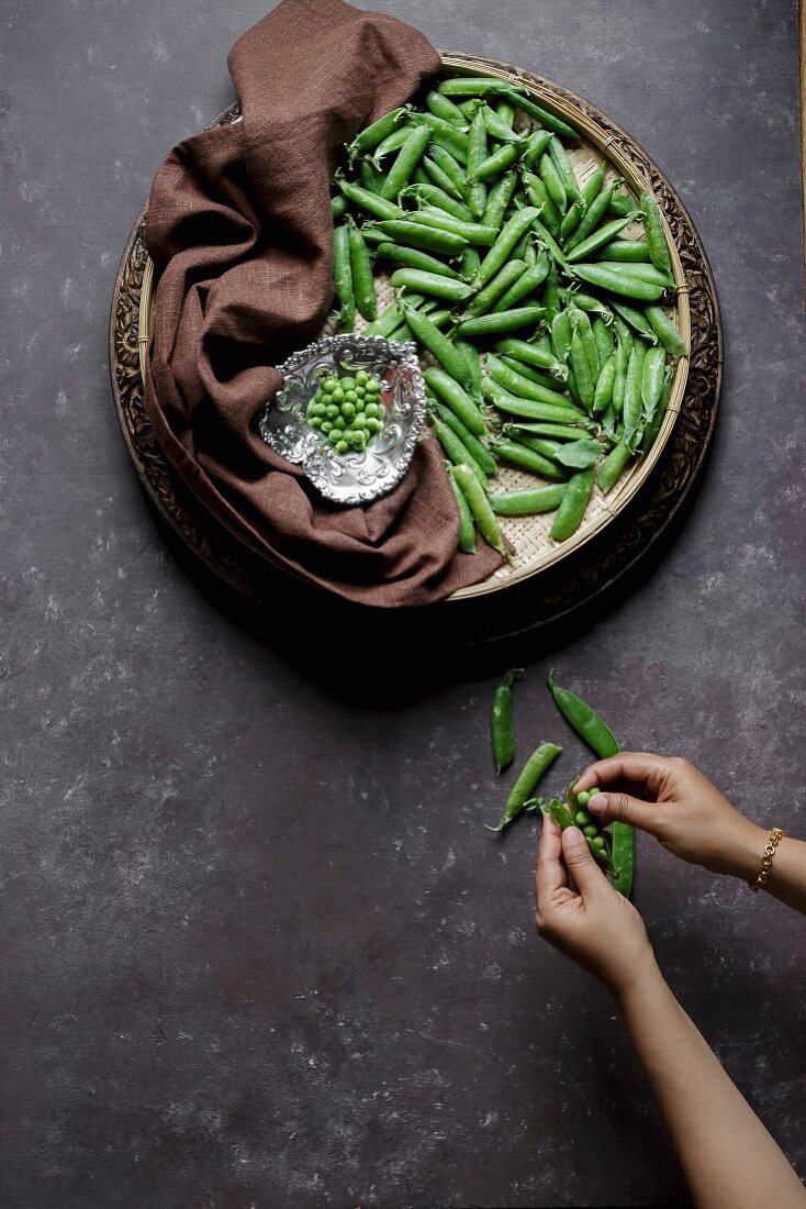 Fresh Peas with Woman Hands