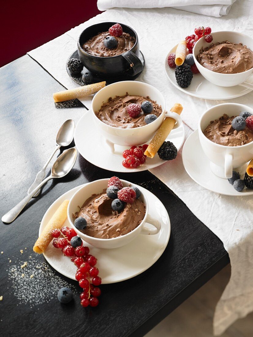 Bowls of chocolate mousse with fruit
