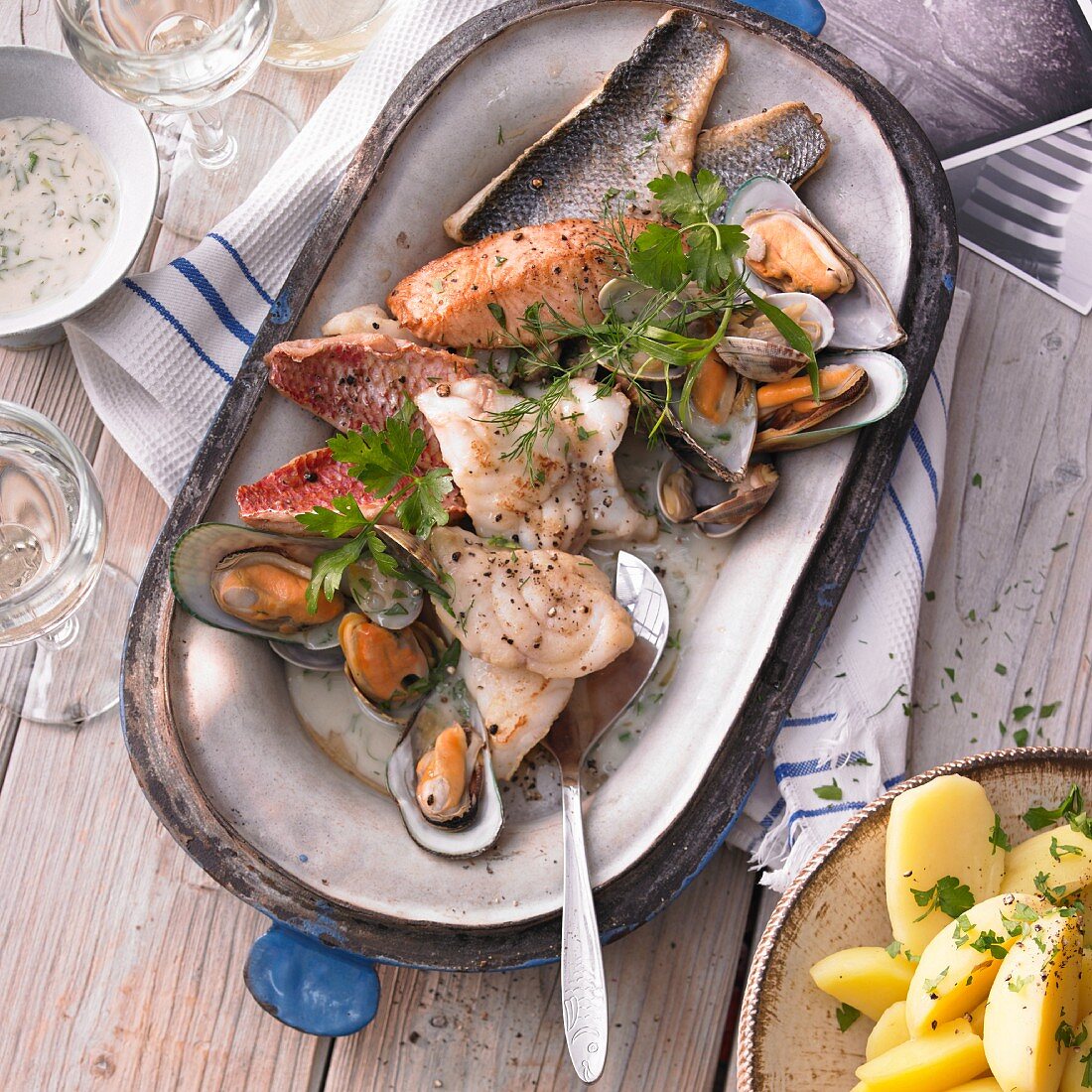 Fish and mussels with parsley potatoes