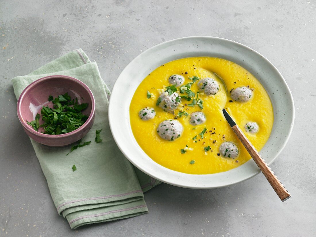 Carrot and ginger creme soup with veal balls