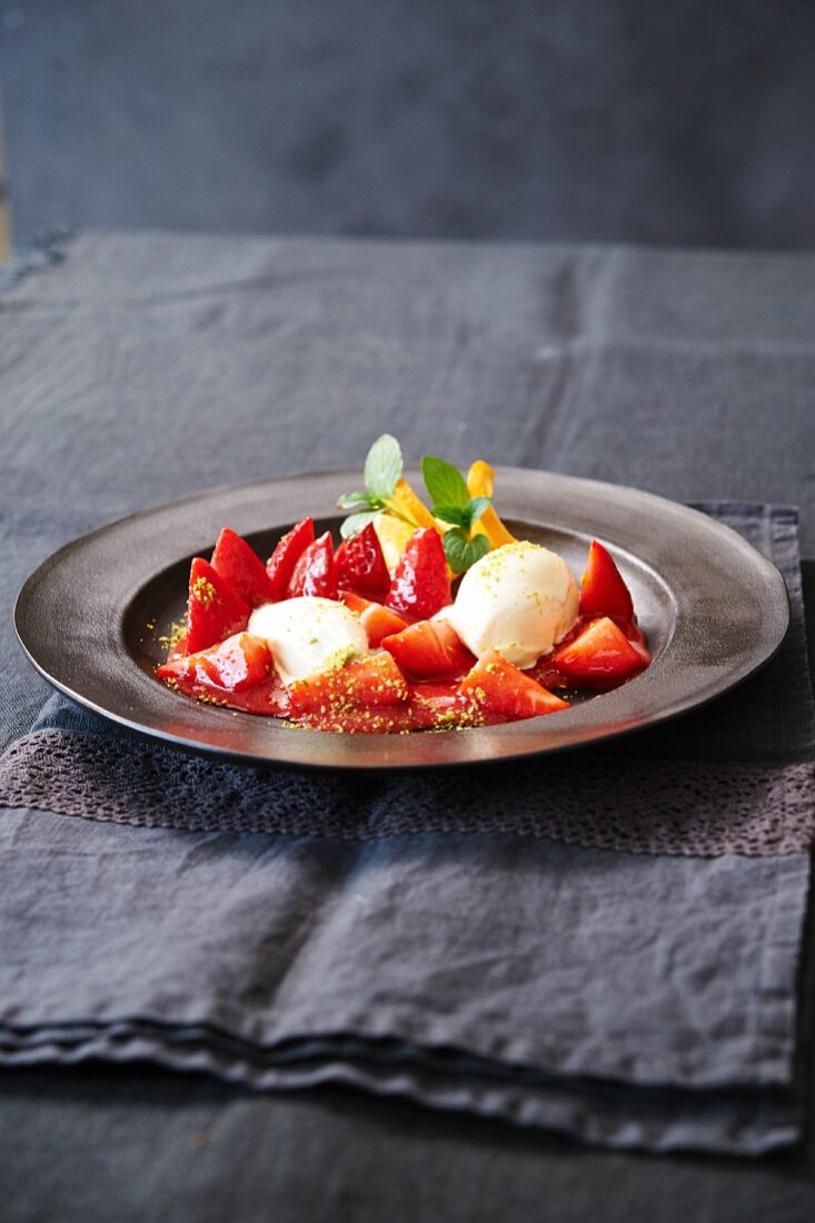 Strawberries romanoff with vanilla ice cream
