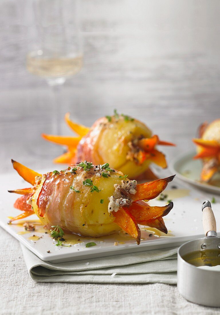 Potatoes wrapped in bacon with pumpkin strips