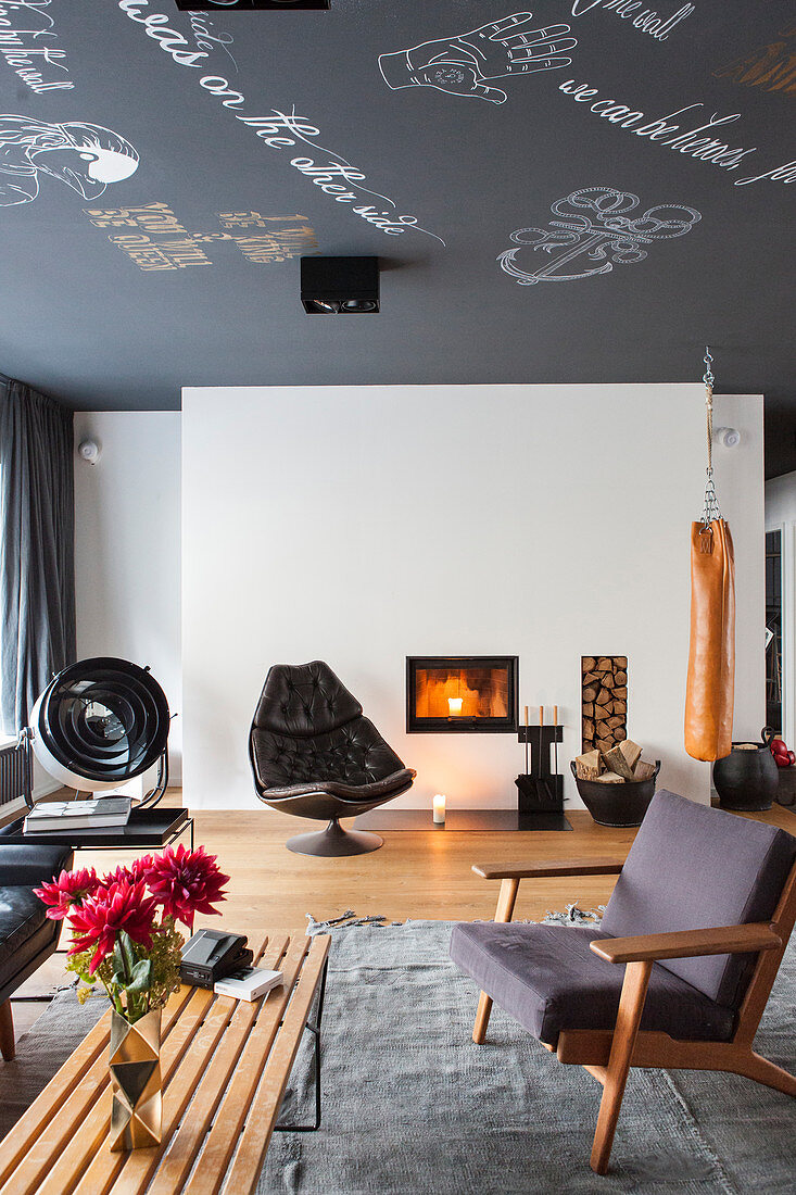 Painted black ceiling in vintage-style living room