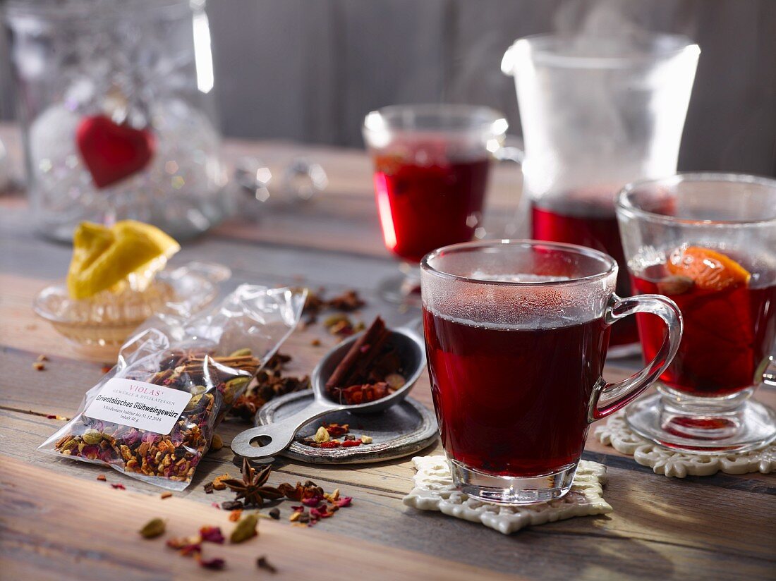 Mulled wine in glasses with oriental mulled wine spices