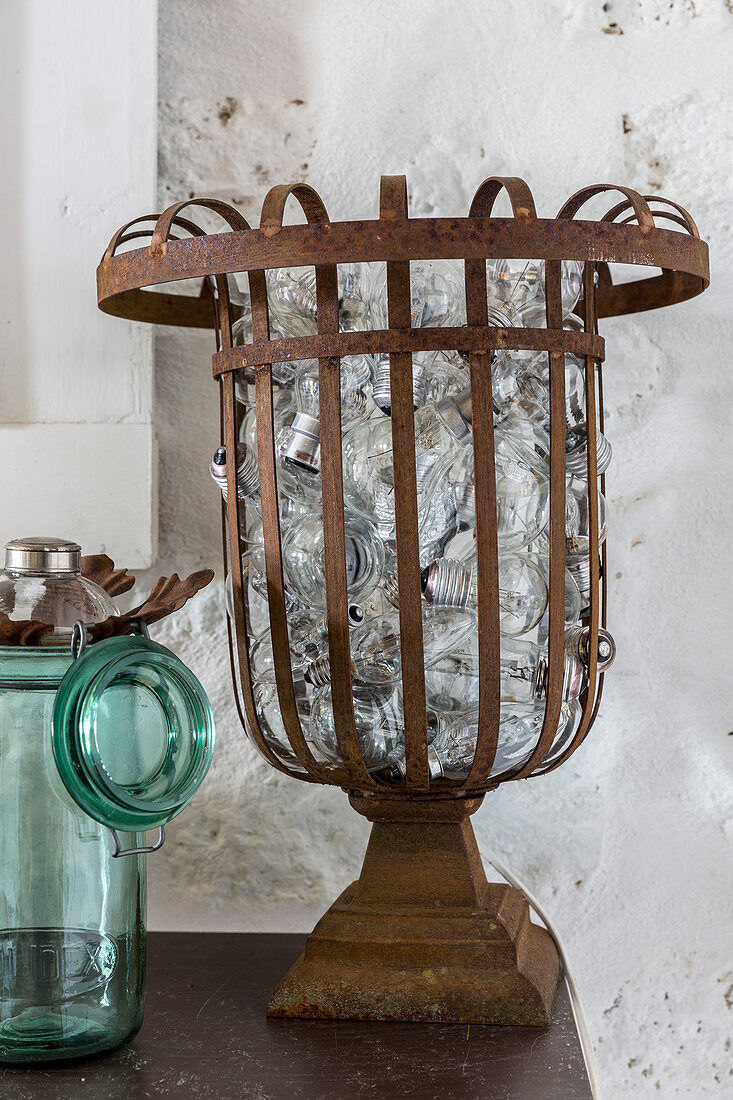 Old light bulbs in vintage metal basket