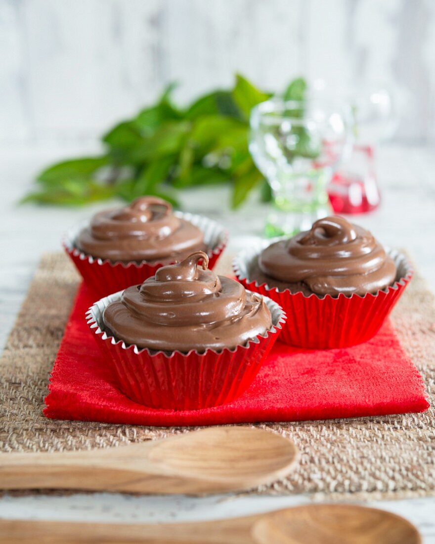 Cupcakes topped with chocolate cream