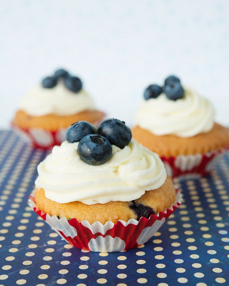 Cupcakes with buttercream and blueberries