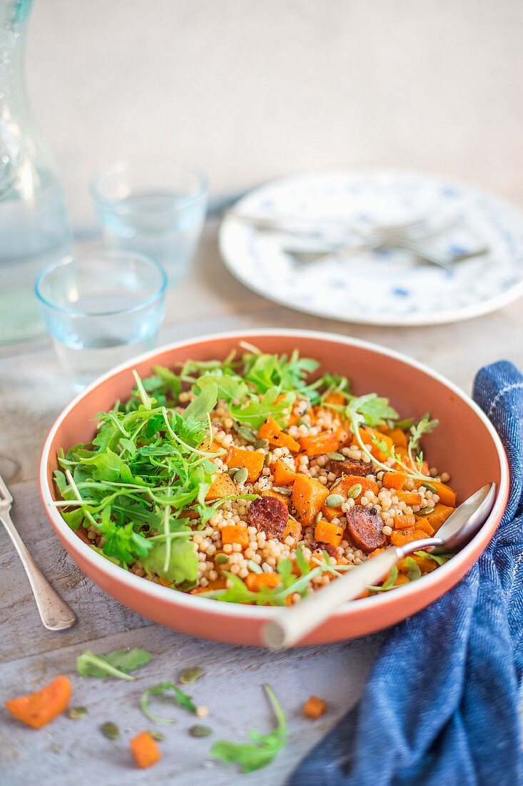 Salad with giant cous cous, roasted butternut squash, chorizo sausage, pumpkin seeds and rocket