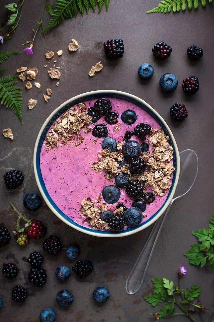 Blueberry and blackberry smoothie bowl with muesli