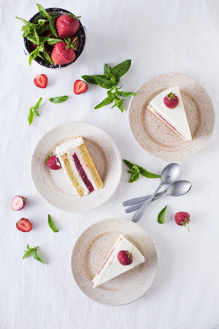 Slices of a strawberry and vanilla cake (seen from above)