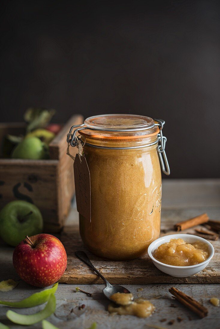 freshly made apple sauce with cinnamon in a jar