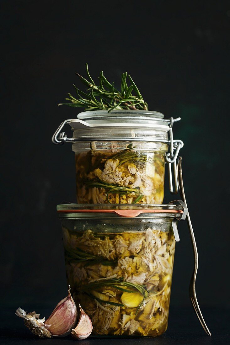 Cooked turkey meat preserved in olive oil with garlic and rosemary
