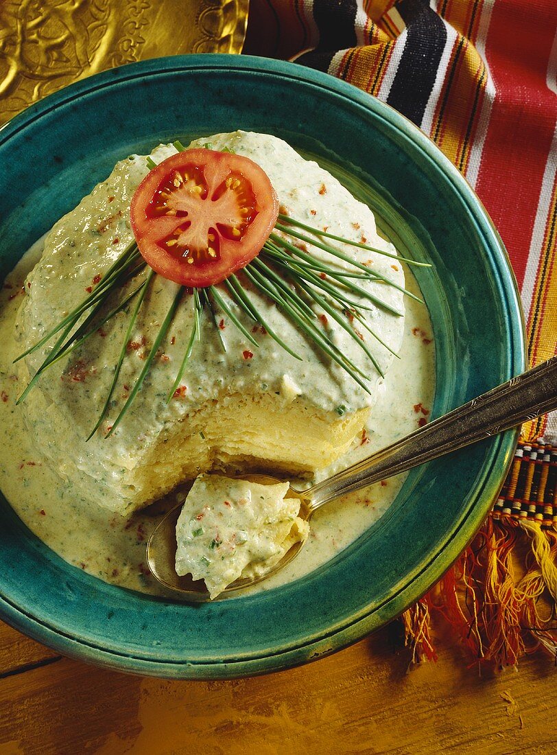 Millet on a Plate with a Piece Missing; Spoon