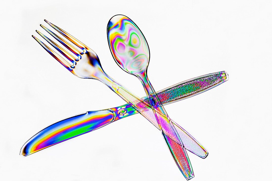 Plastic cutlery under polarised light