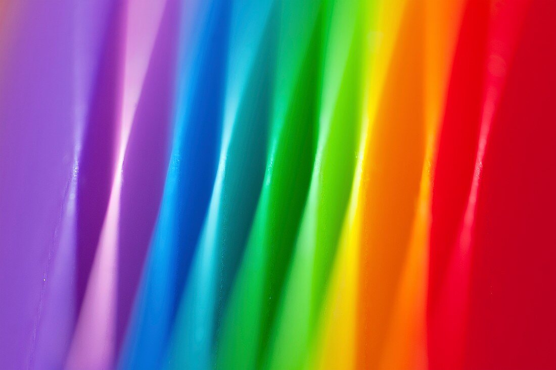 Rainbow of folded paper