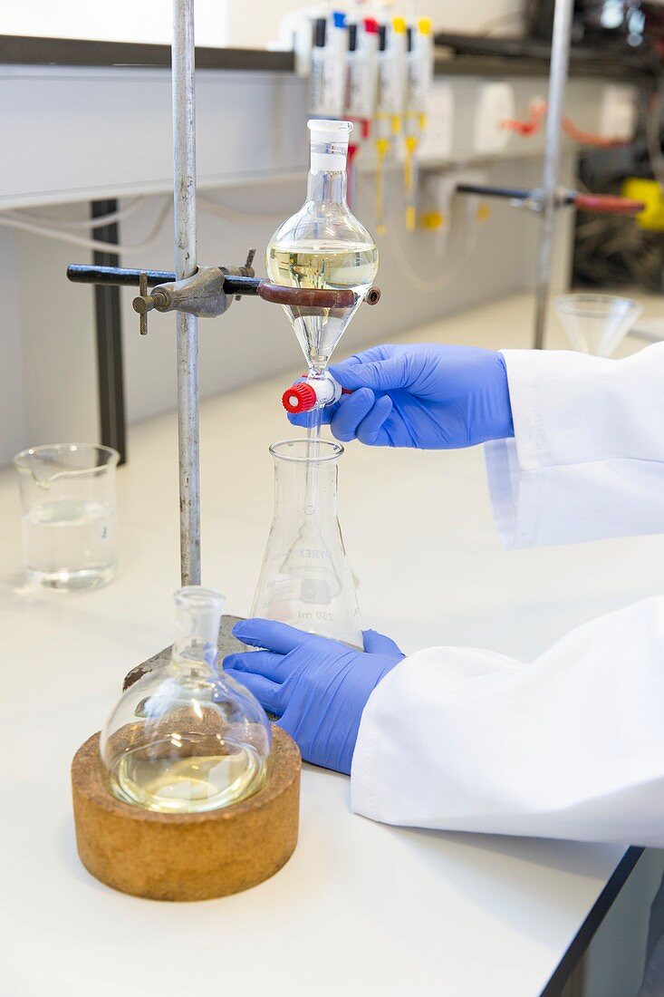 Scientist doing a solvent-based extraction