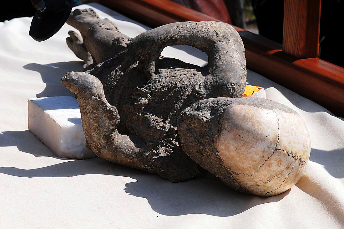 Body cast of a child victim of Pompeii eruption
