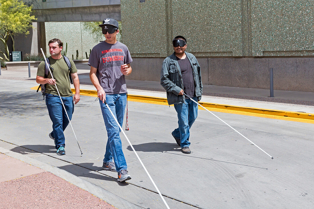 Practicing using white canes, USA