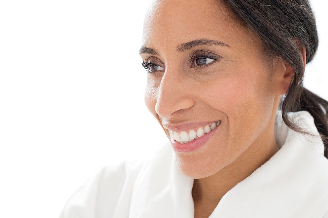 Woman smiling and looking away