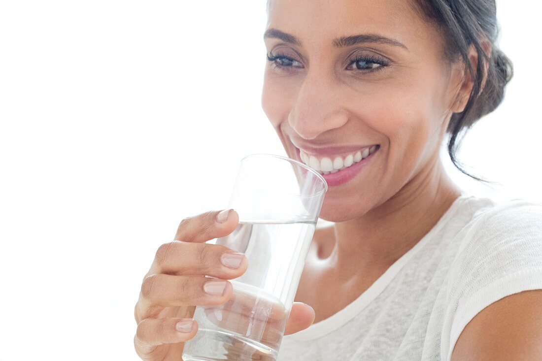 Woman with glass of water