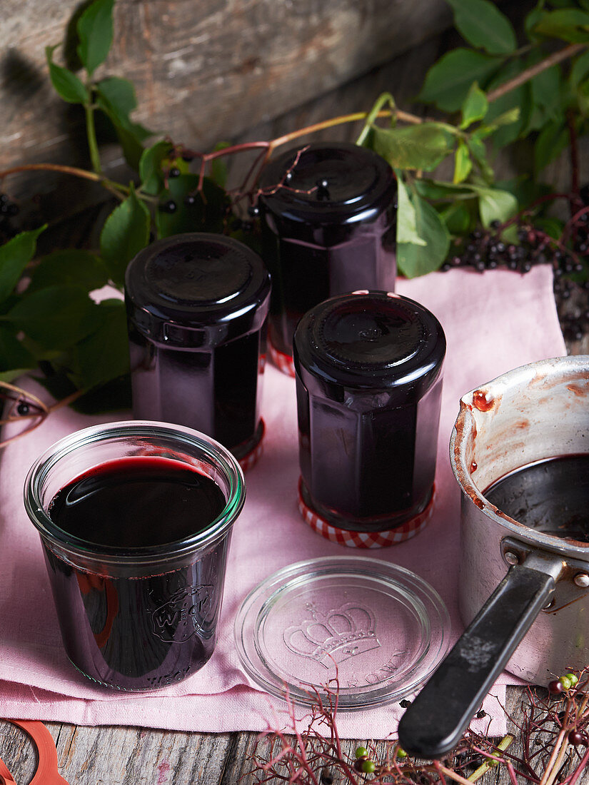 Homemade elderberry jelly in glass jars