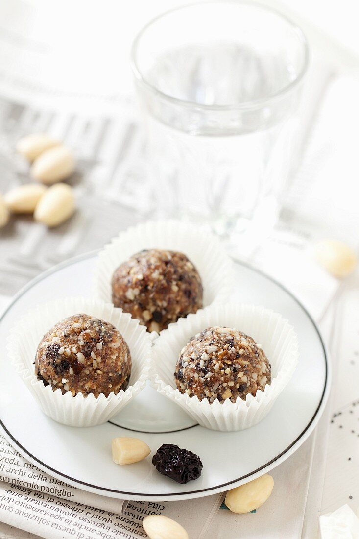 Cherry and Almond Energy Balls on a plate