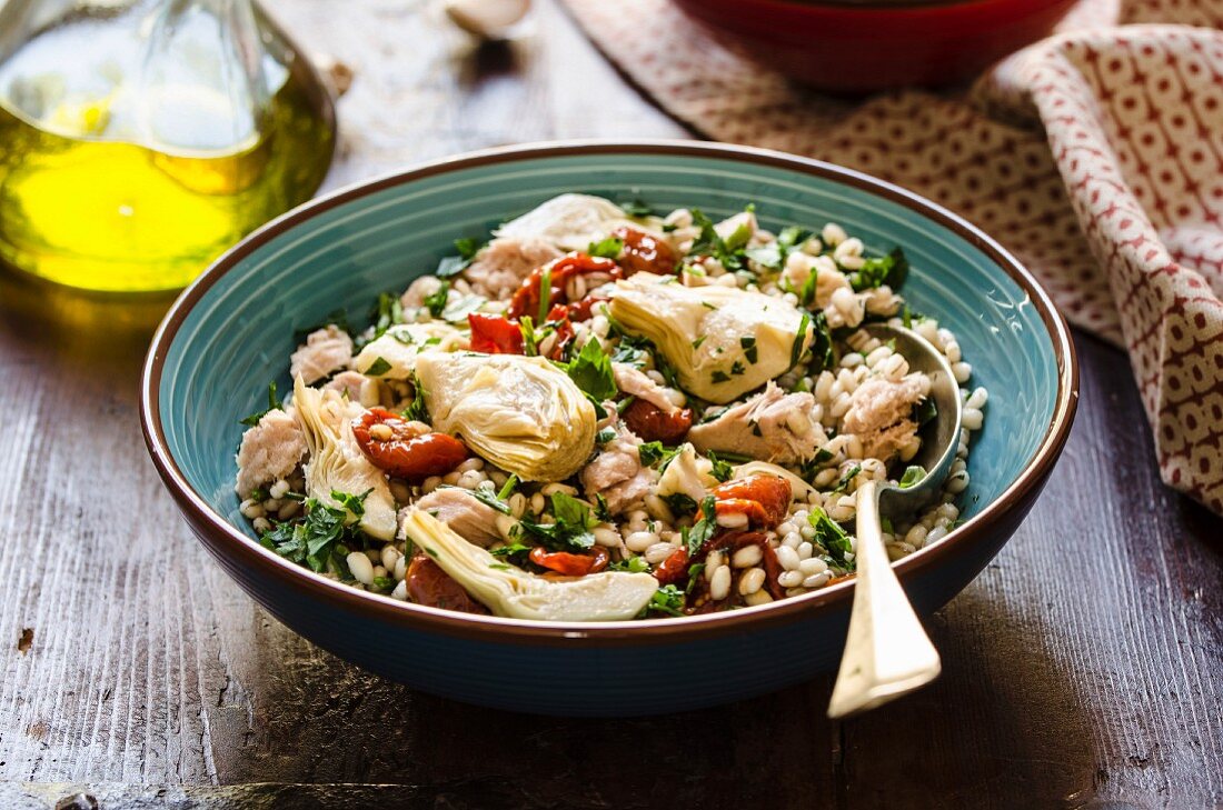 Grain salad with barley, artichoke and oven-roasted tomatoes