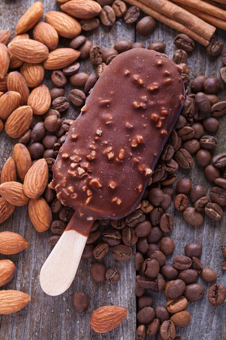 Chocolate ice lolly with almonds