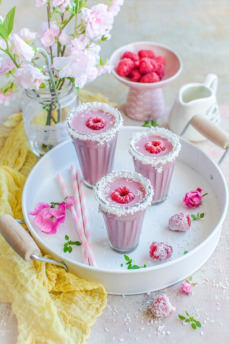 Raspberry smoothies with coconut flakes