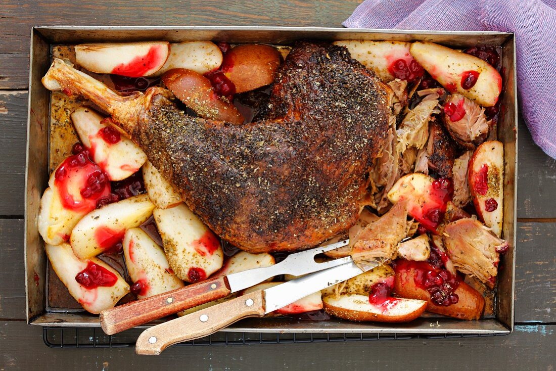 Baked turkey leg with pears and cranberries