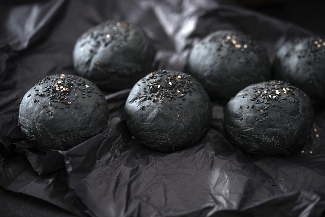 Vegan black burger buns with sesame seeds