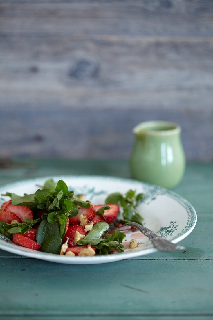 Stinging nettle salad with strawberries