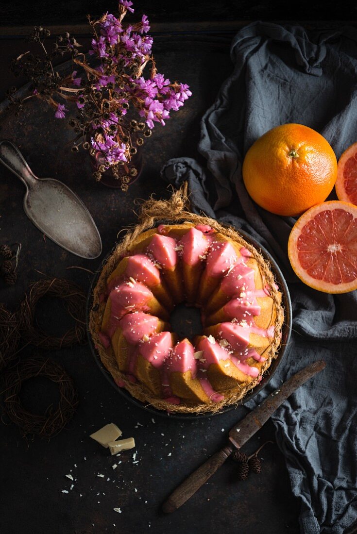 Vegan ring-shaped grapefruit Bundt cake with white rice milk chocolate