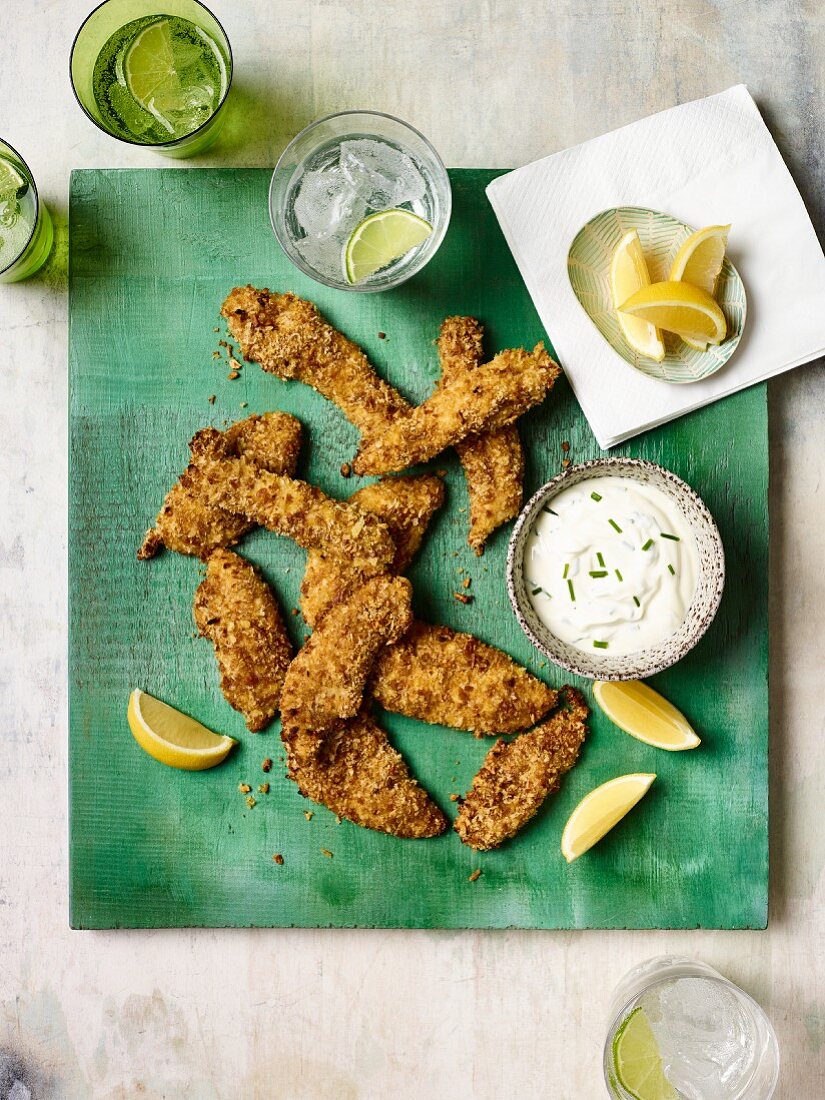 Crumbed chicken tenderloins with a chive dip