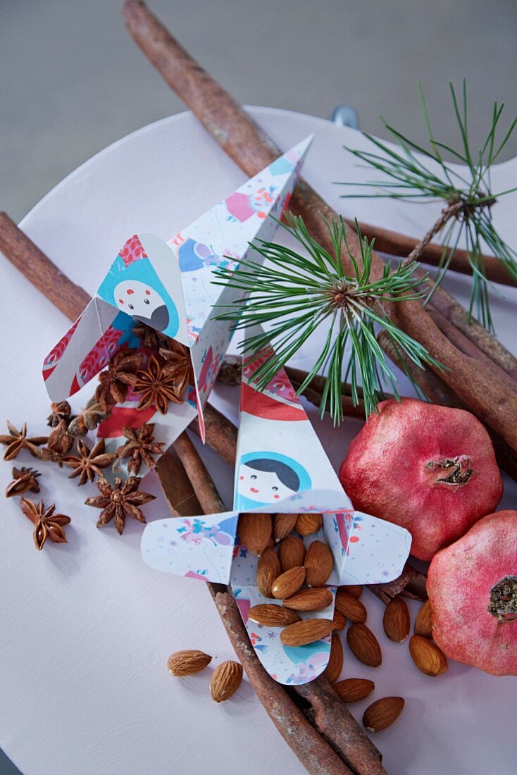 Almonds and star anise in paper gift bags