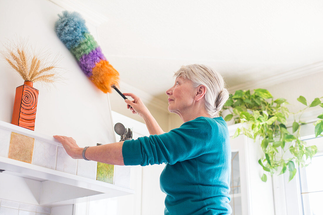 Senior woman house cleaning