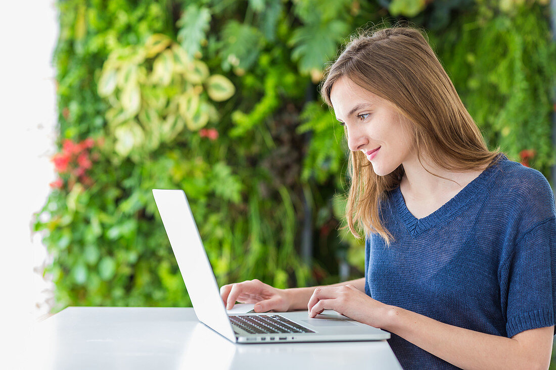 Woman using a laptop