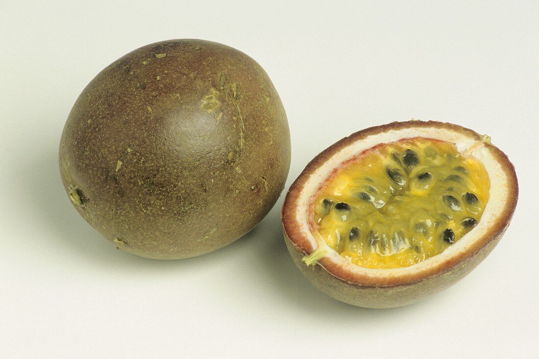 Whole and Half of a Passion Fruit