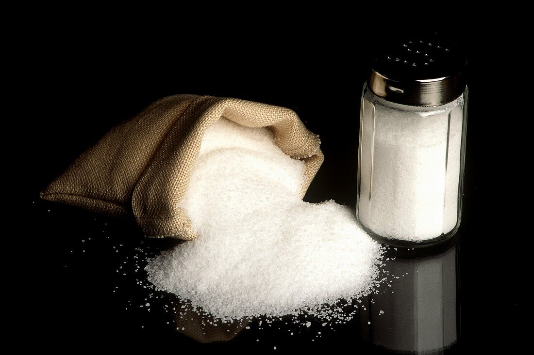 Salt Spilling Out of Bag; Salt Shaker