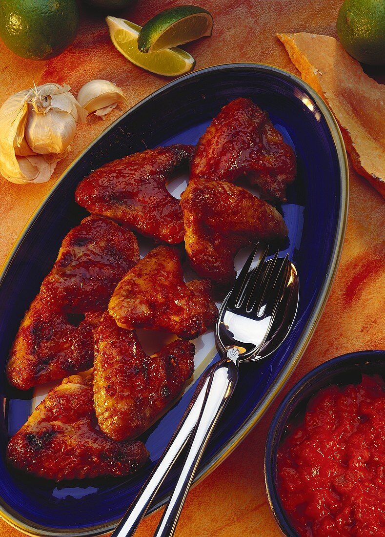 Oven grilled chicken wings with spicy sauce