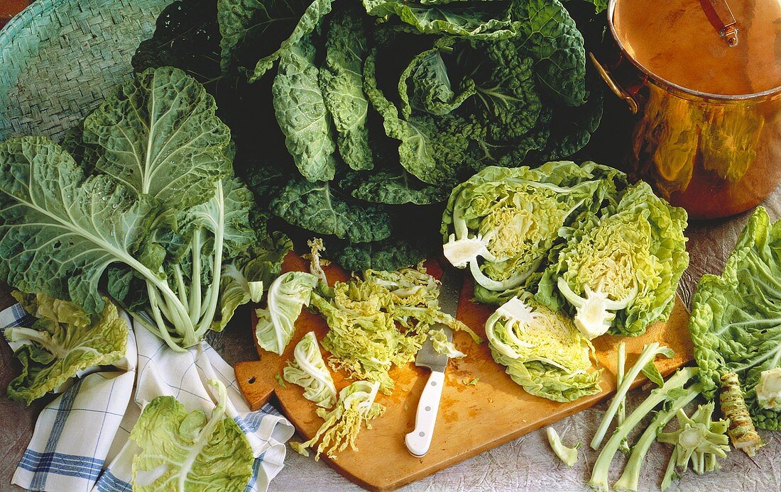 Still Life of Assorted Cabbage; Whole and Sliced