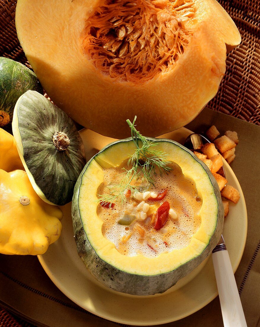 Pumpkin & barley soup with paprika in hollowed-out pumpkin