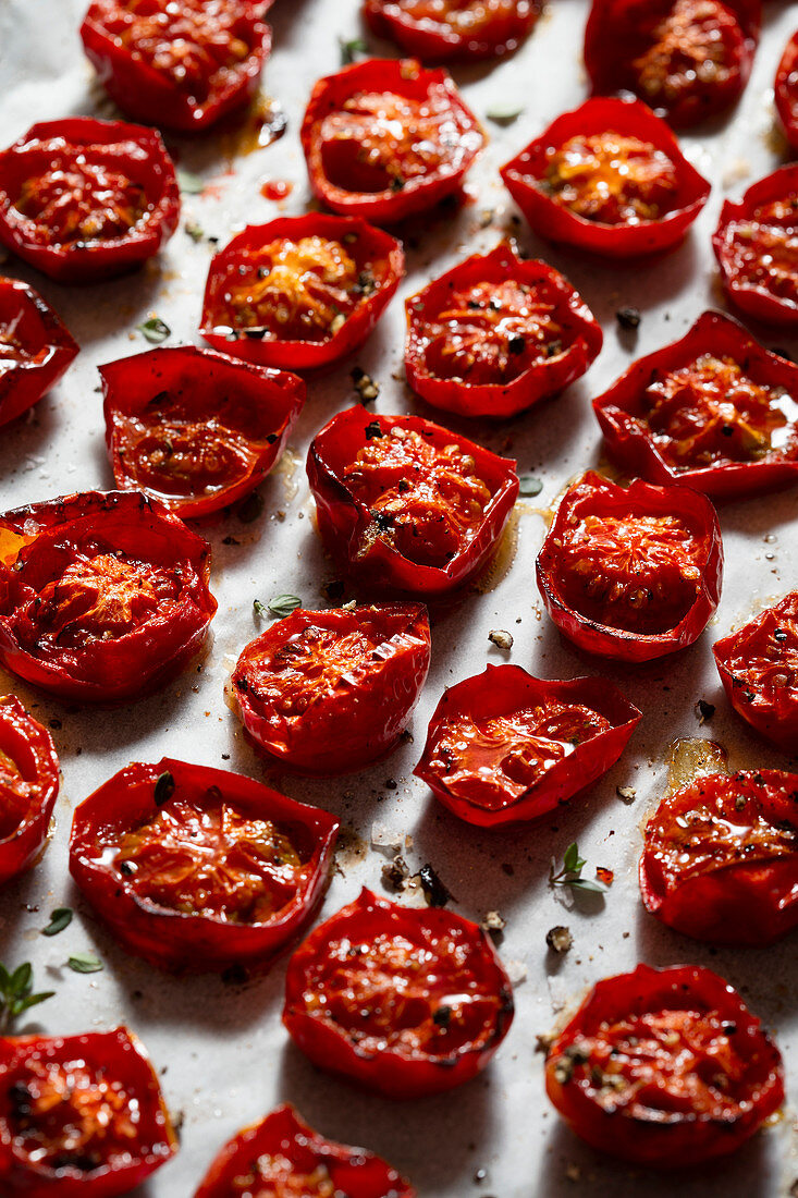 Oven roasted cherry tomatoes, sprinkled with thyme leaves, sea salt and cracked black pepper