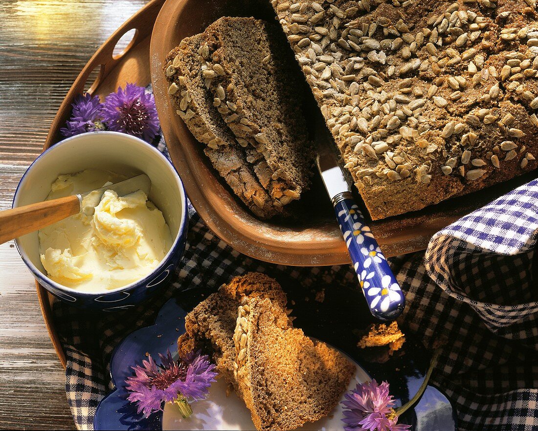 Spiced crusty bread with sunflower seeds, from a clay pot