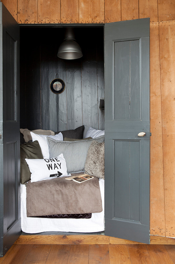 Collection of scatter cushions on cubby bed