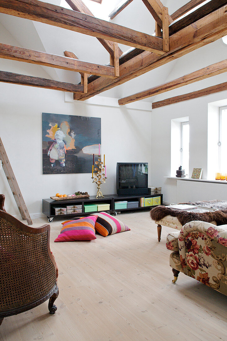 Cathedral ceiling living room with wooden beams